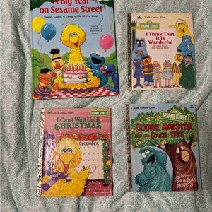 4 Sesame street books. Some has some writing in the them. From 1977 to 1989
